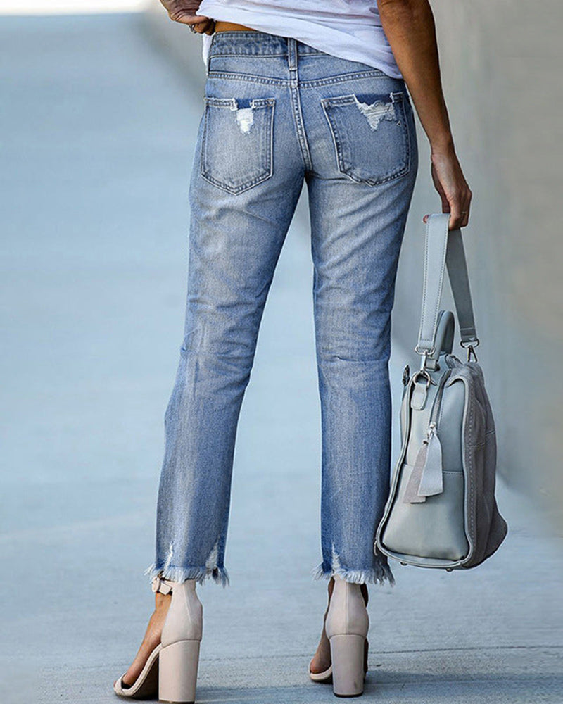 Clara | Slim fit women's jeans with rips and frayed edges