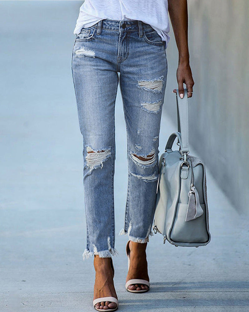 Clara | Slim fit women's jeans with rips and frayed edges